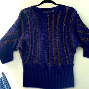 Beautiful sweater in Navy/Royal Blue & Gold accents. Fits great off the shoulder